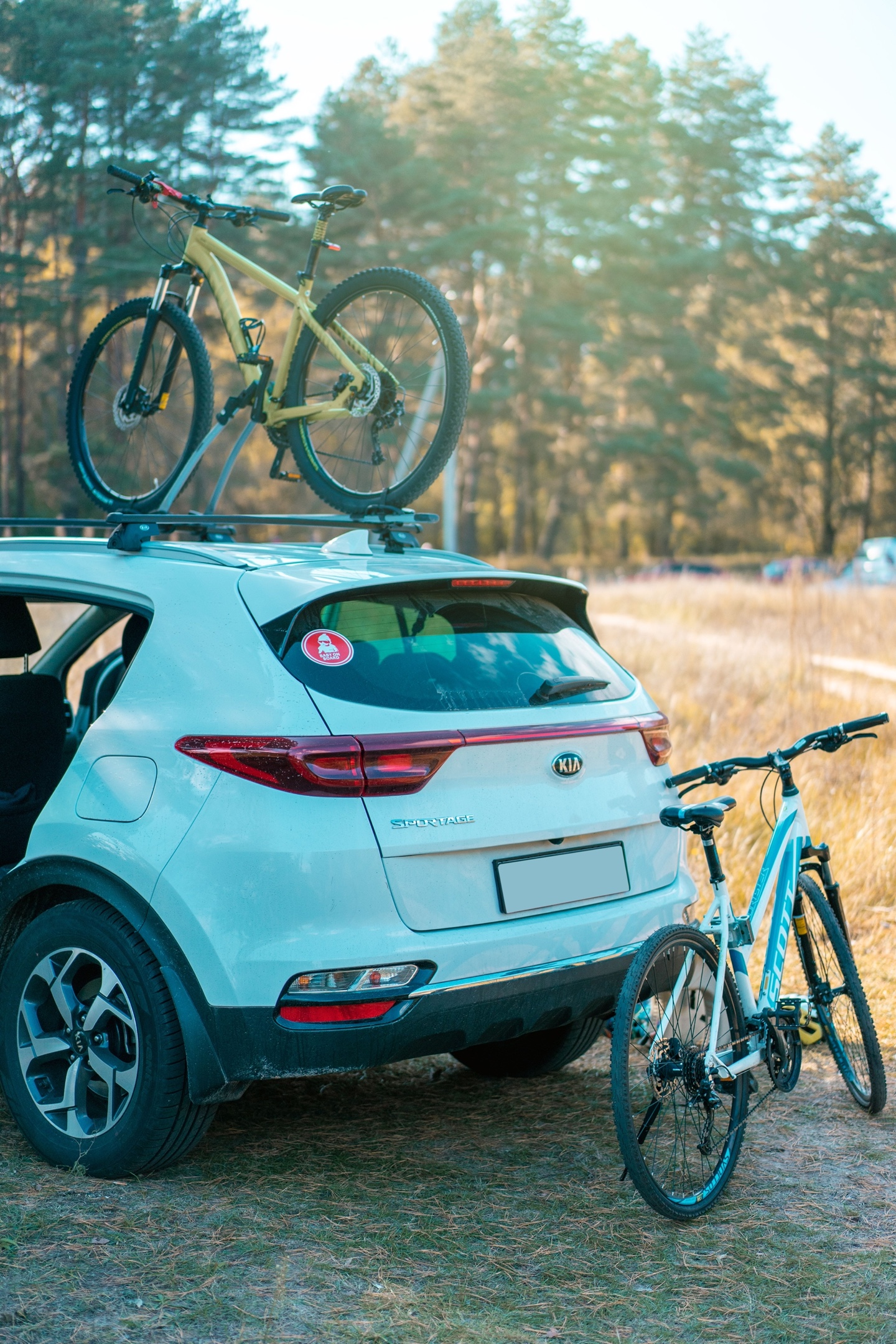SUV with a roof-mounted bike rack, representing accessory installs